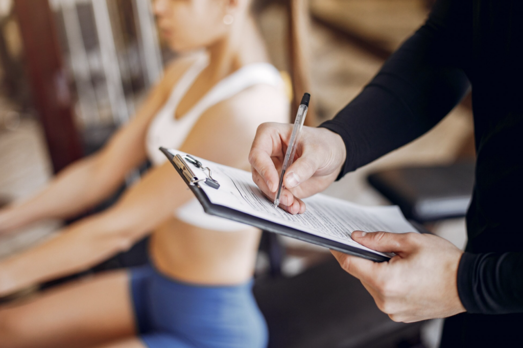 A-beautiful-sports-couple-is-engaged-in-a-gym