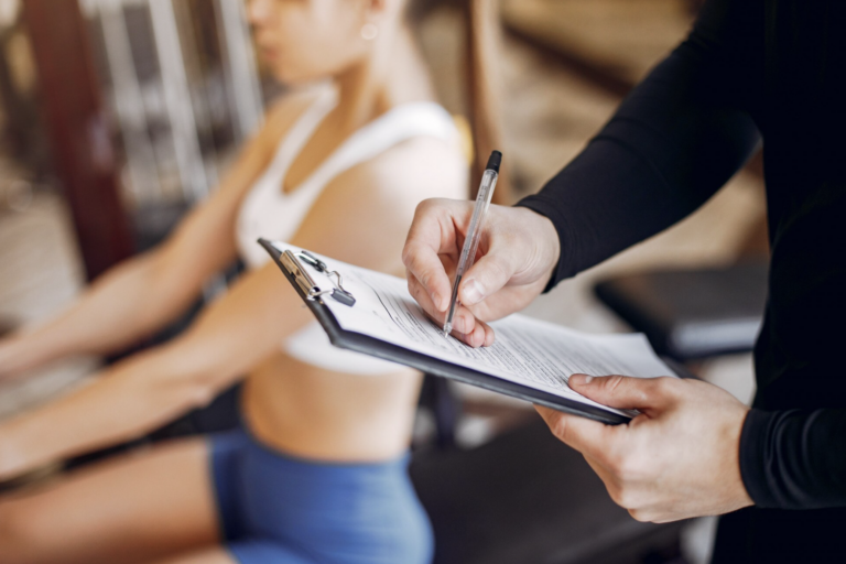 A-beautiful-sports-couple-is-engaged-in-a-gym